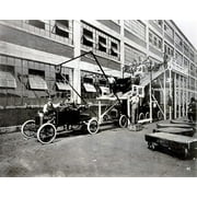 Ford Motor Co.-The Final Assembly Line At The Ford Motor Company'S Highland Park Plant. Bodies Were Skidded Down The Wooden Ramp And Lowered Onto The Chassis As They Moved Along Below.1913 - Cpl