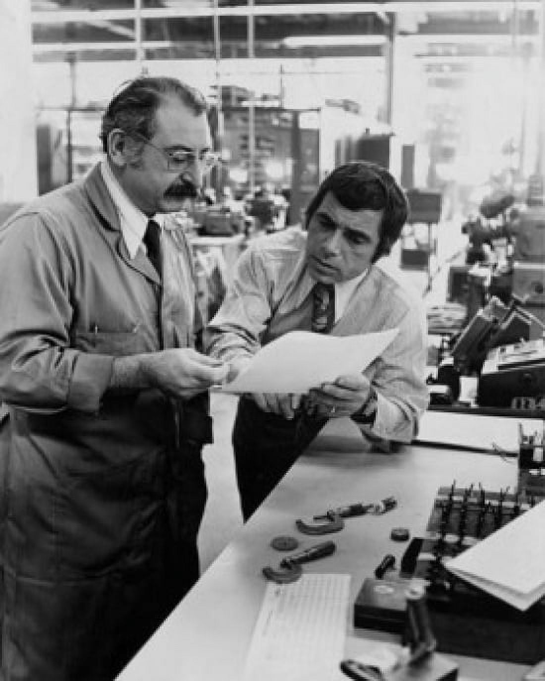 Foreman giving instructions to employee in factory Canvas Art - (18 x 24)