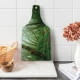 thumbnail image 1 of Forest Cutting Board, Spooky Tropical Exotic Fog Jungle in Rainforest Nepal Climate Picture Print, Decorative Tempered Glass Cutting and Serving Board, Wine Bottle Shape, Green Brown, by Ambesonne, 1 of 1