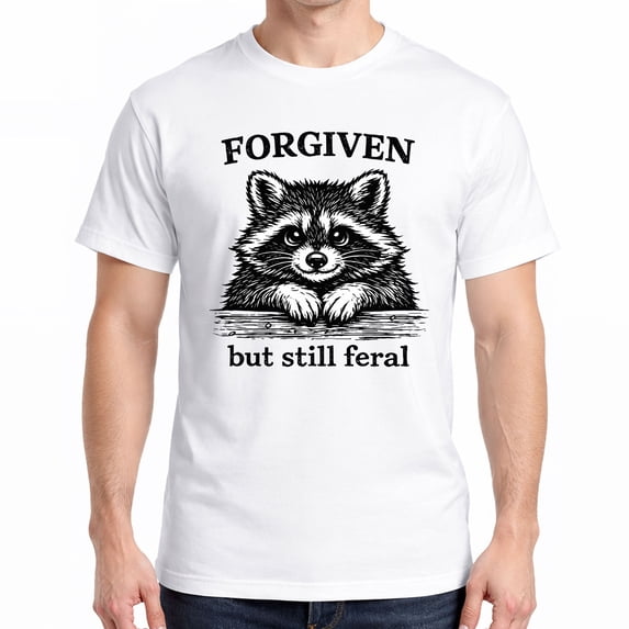 Forgiven But Still Feral T-Shirt – Funny Raccoon Graphic Tee – Cute Christian Humor Shirt for Men & Women