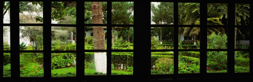Formal garden viewed through a window Hosteria La Cienega Latacunga Cotopaxi Ecuador Canvas Art - Panoramic Images (27 x 9)