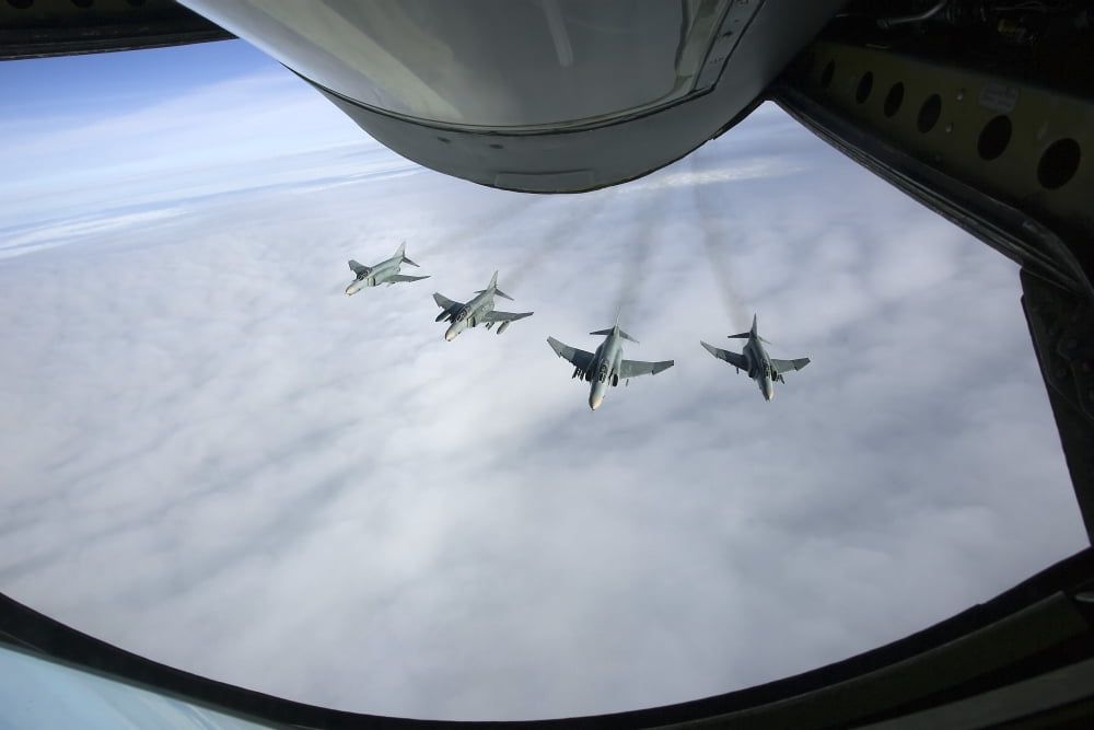 Formation of Luftwaffe F-4F Phantom IIs behind a tanker Canvas Art - Gert KromhoutStocktrek Images (35 x 23)