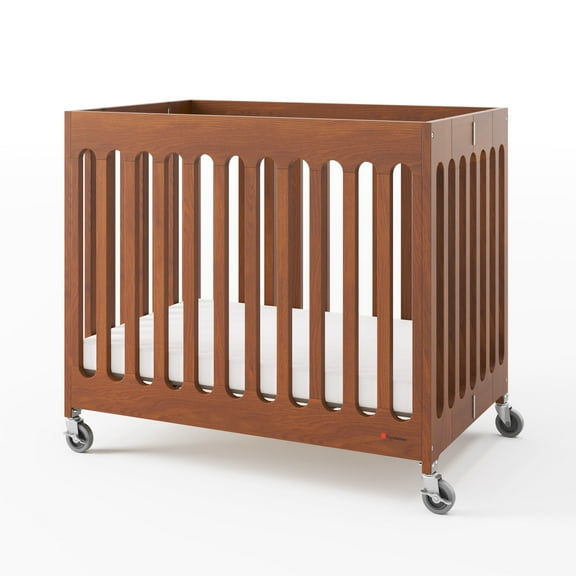 Foundations Boutique Compact Folding Hotel Crib with 3" Mattress and Locking Wheels, Cherry