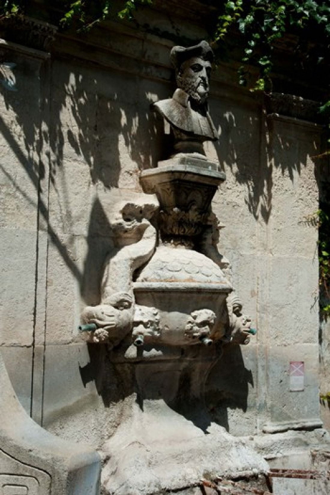 Fountain with the bust of Nostradamus Rue Carnot St-Remy-de-Provence Bouches-Du-Rhone Provence-Alpes-Cote dAzur France Canvas Art - Panoramic Images (24 x 36)