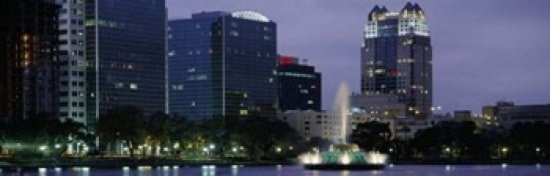 Fountain in a lake lit up at night Lake Eola Summerlin Park Orlando Orange County Florida USA Canvas Art - Panoramic Images (18 x 6)