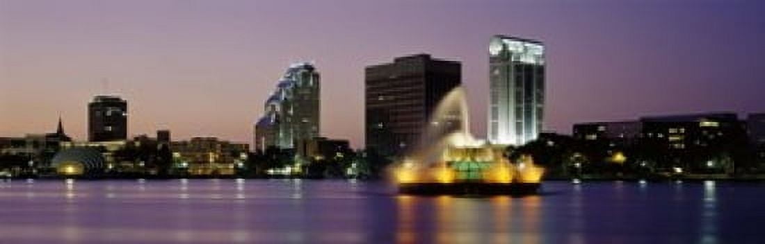 Fountain in a lake lit up at night Lake Eola Summerlin Park Orlando Orange County Florida USA Canvas Art - Panoramic Images (18 x 6)