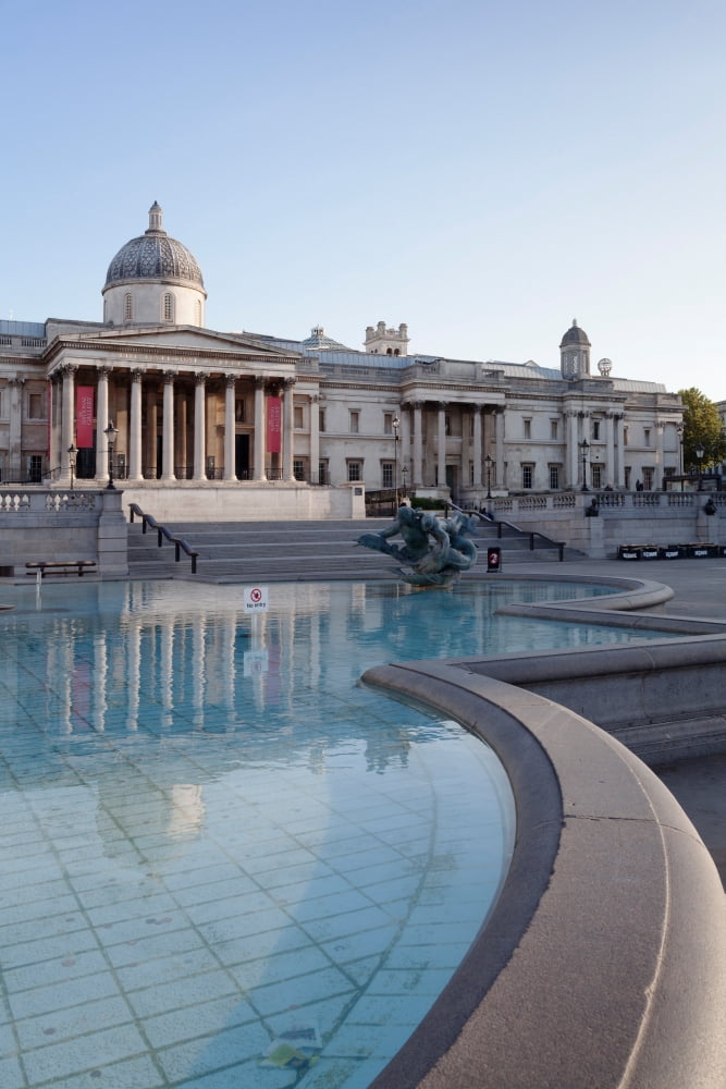 Fountain with art museum in the background National Gallery Trafalgar Square London England Canvas Art - Panoramic Images (27 x 9)