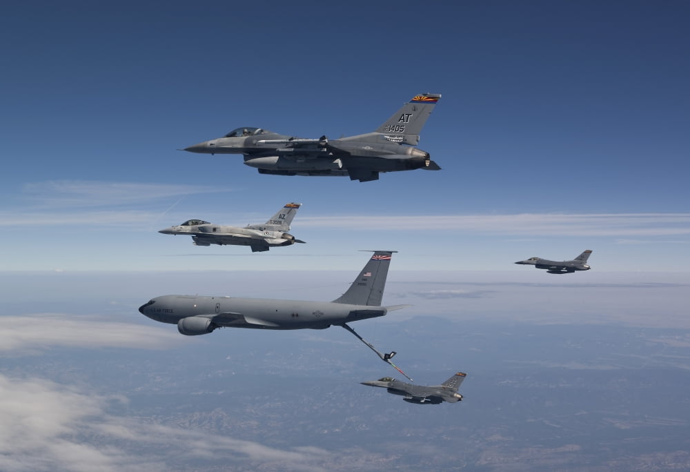 Four F-16s and a KC-135 fly in formation over Arizona Canvas Art - HIGH-G ProductionsStocktrek Images (35 x 24)