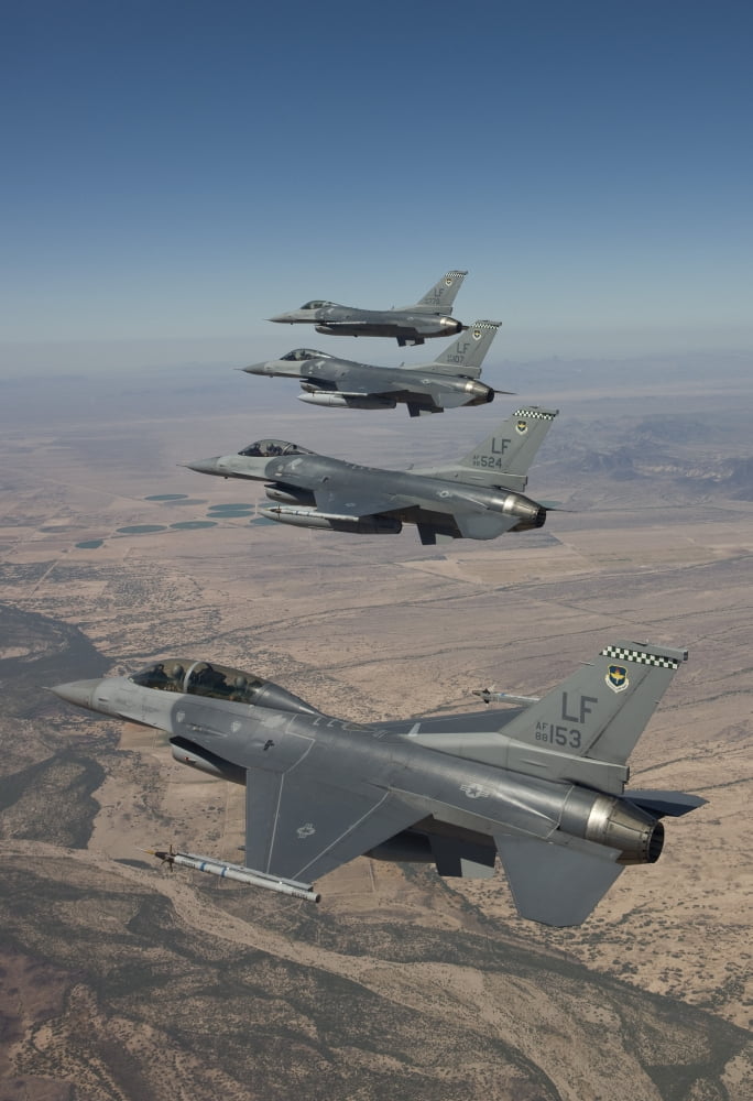 Four F-16s maneuver on a training mission over the Arizona desert Canvas Art - HIGH-G ProductionsStocktrek Images (24 x 34)