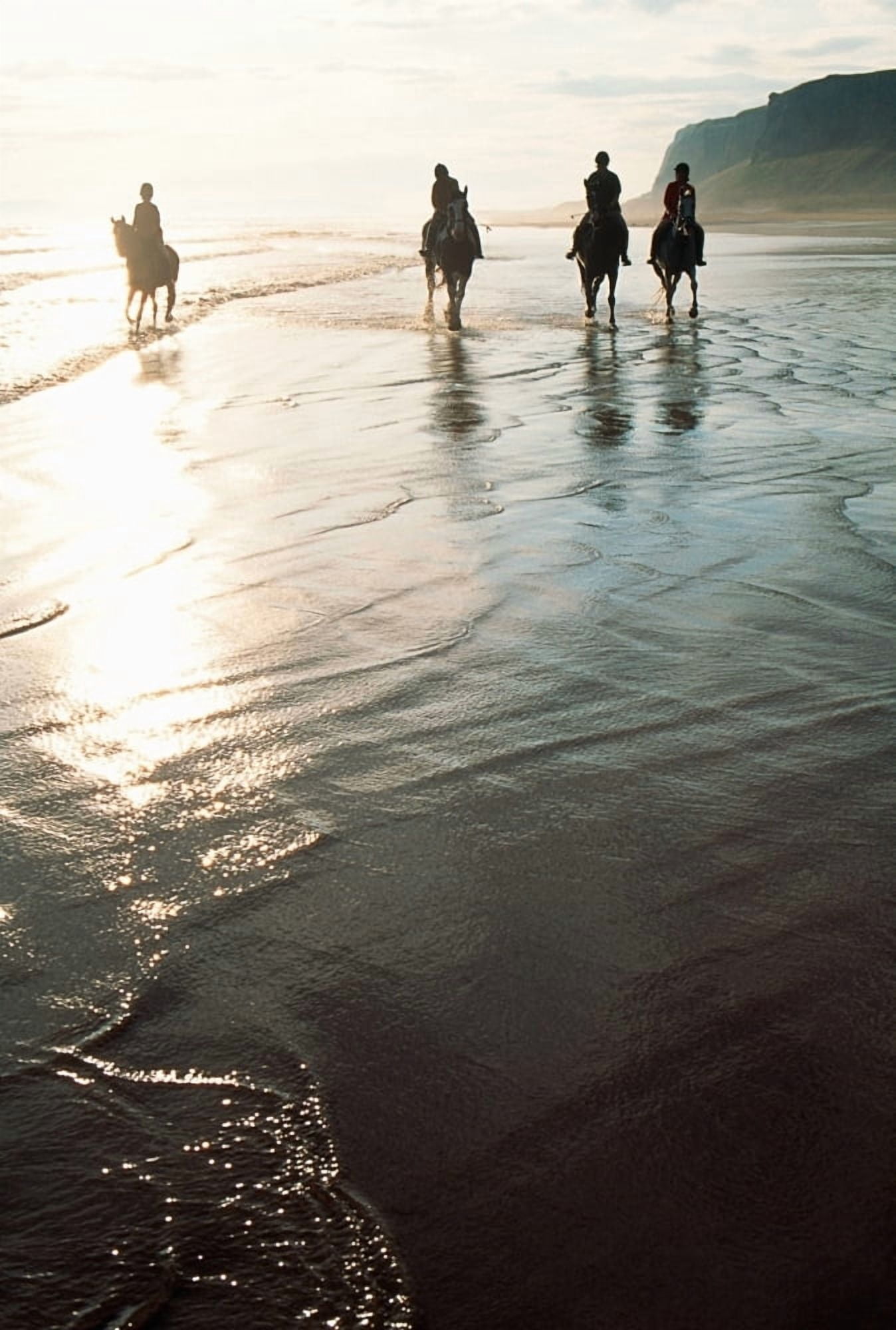 Four People Horseback Riding On A Coastal Beach Ireland Canvas Art - The Irish Image Collection Design Pics (22 x 34)