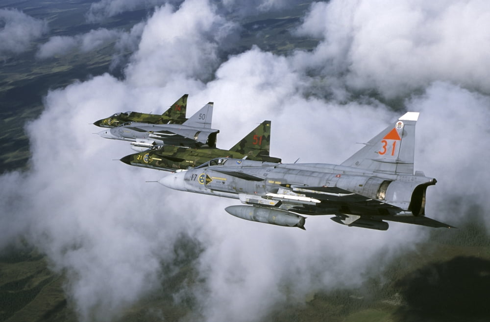 Four Saab 37 Viggen fighters of the Swedish Air Force Canvas Art - Daniel KarlssonStocktrek Images (35 x 23)