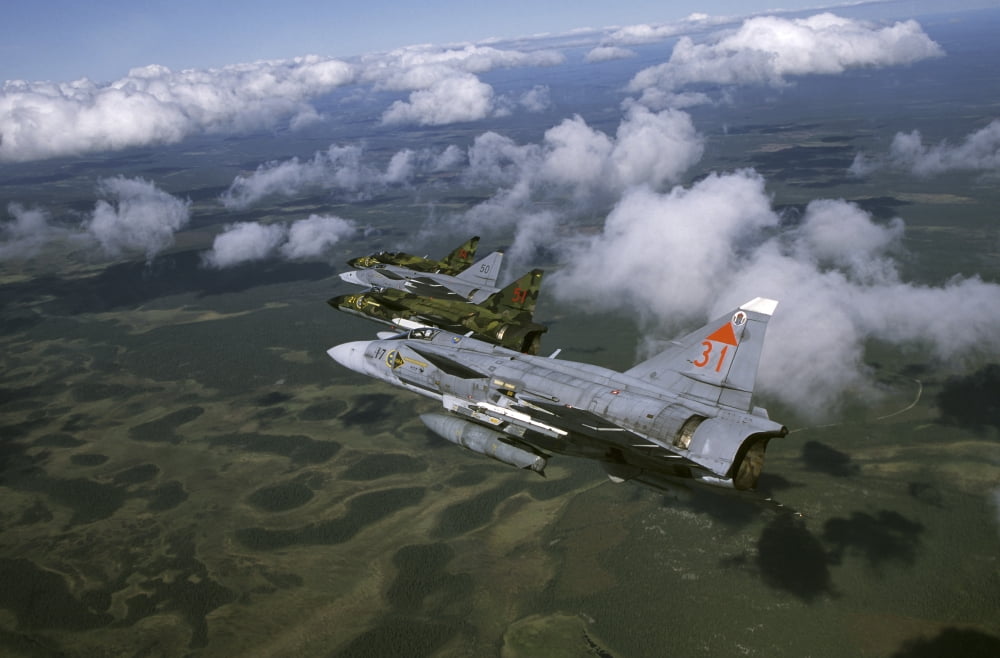 Four Saab 37 Viggen fighters of the Swedish Air Force Canvas Art - Daniel KarlssonStocktrek Images (35 x 23)