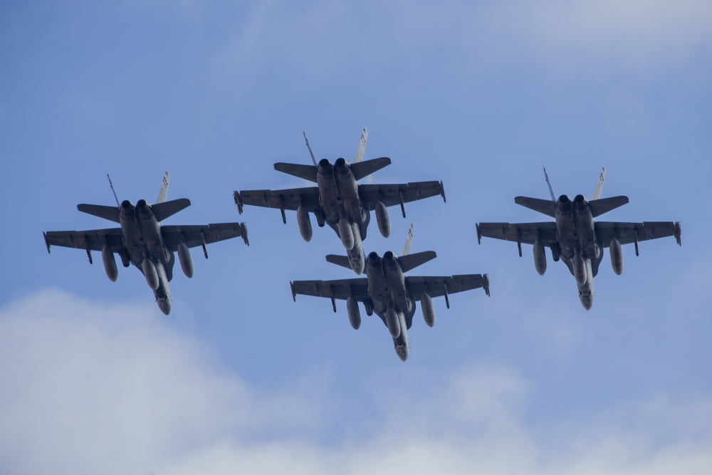 Four Spanish Air Force F-18M Hornets fly in formation above Spain Canvas Art - Timm ZiegenthalerStocktrek Images (17 x 12)