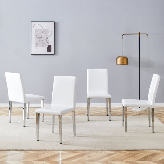 Four White PU dining chairs,Silver Metal Legs.Simple and versatile, comfortable and accompanied. Exquisite and versatile dining chairs unlock a comfortable new experience.(Set of 4)42775