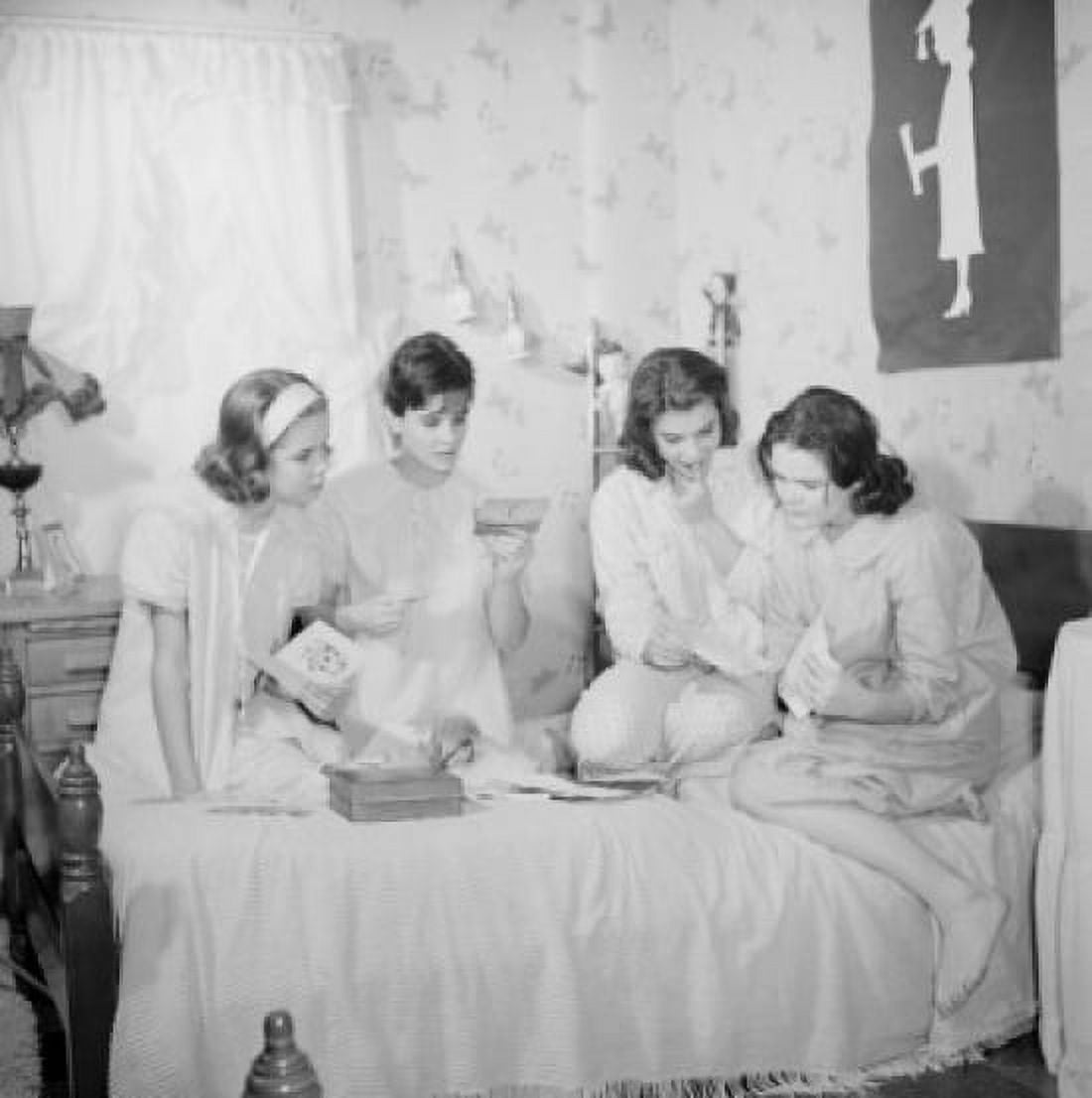 Four girls sitting on bed and reading letters Canvas Art - (18 x 24)