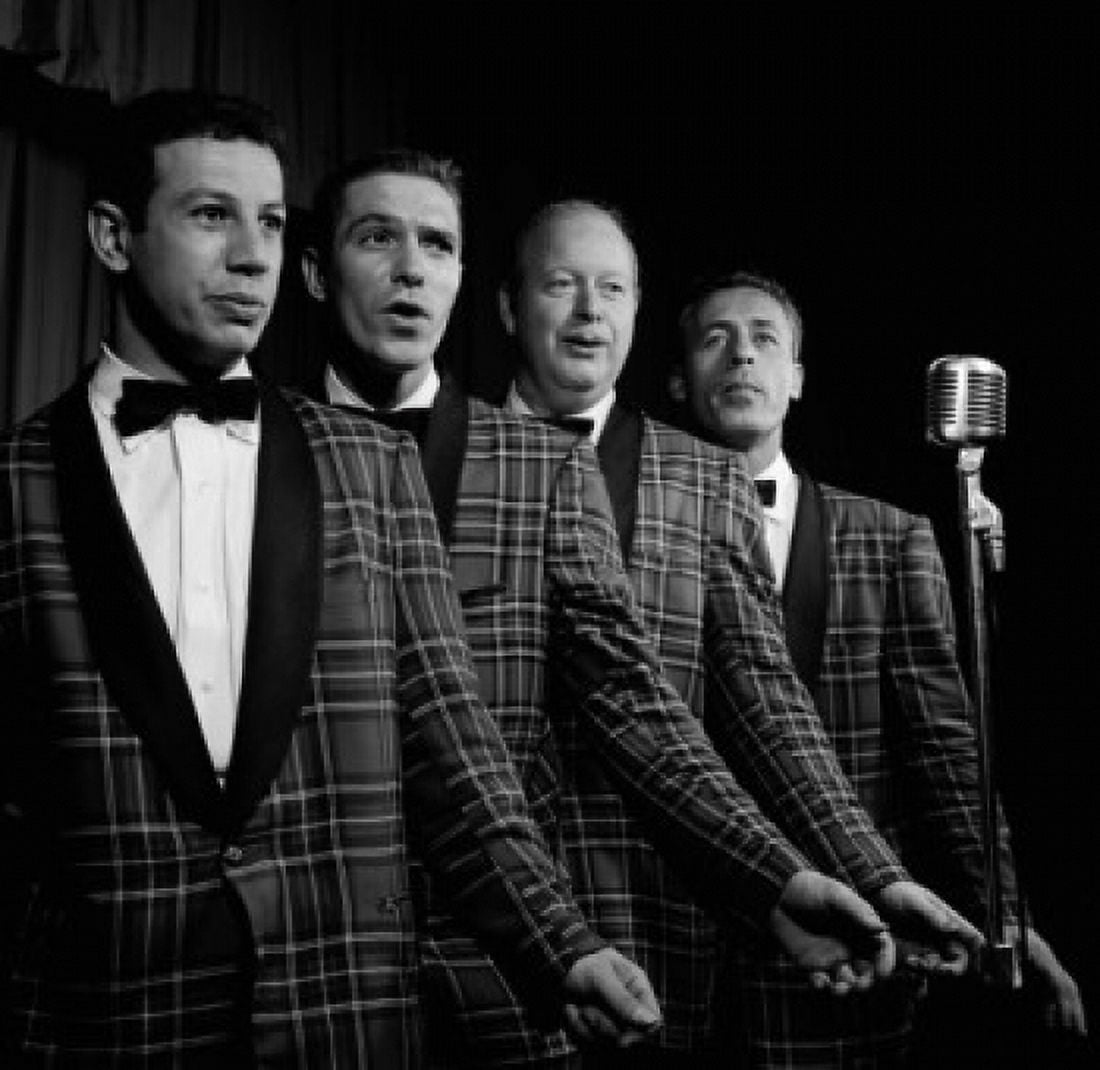 Four male singers performing on stage Canvas Art - (24 x 36)
