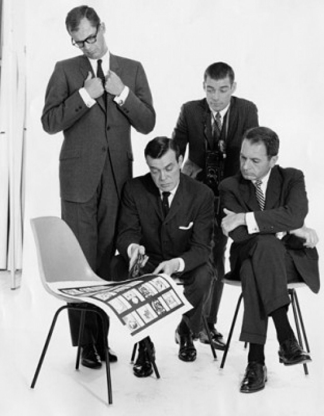 Four mid adult men talking Canvas Art - (18 x 24)