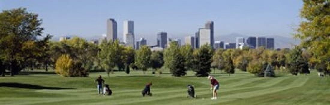 Four people playing golf with buildings in the background Denver Colorado USA Canvas Art - Panoramic Images (18 x 6)