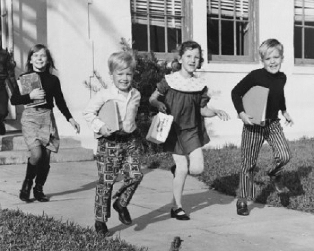Four school children running out of school Canvas Art - (24 x 36)