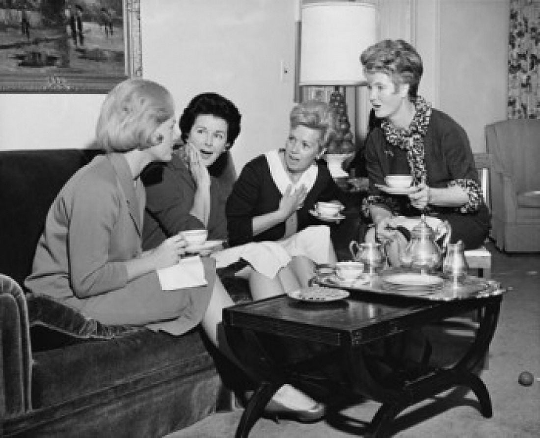 Four young women sitting together drinking tea Canvas Art - (24 x 36)