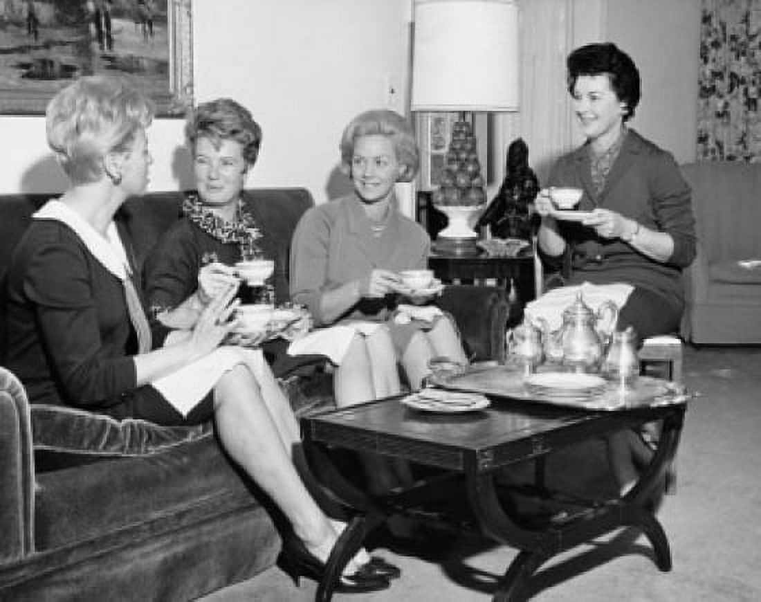 Four young women talking to each other Canvas Art - (18 x 24)