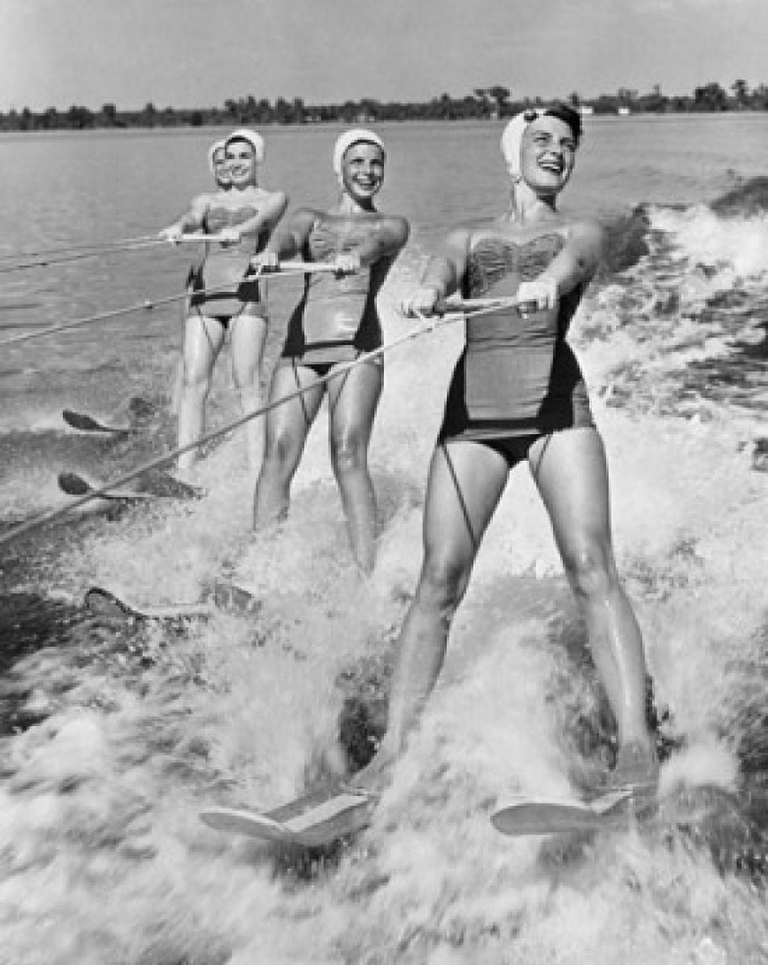 Four young women waterskiing in the sea Canvas Art - (18 x 24)
