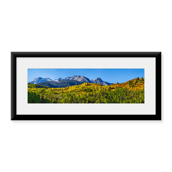 Framed Art Print, Aspen trees with mountains in the background by Panoramic Images, 25-7/8" x 9-7/8"