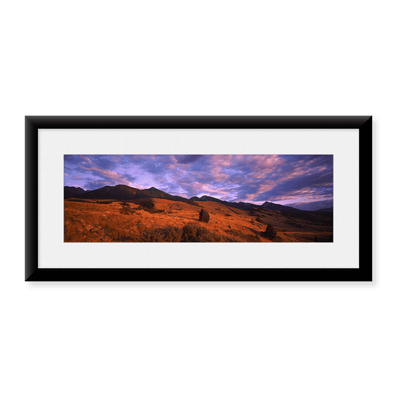 Framed Art Print, Clouds over mountainous landscape at dusk by Panoramic Images, 25-7/8" x 9-7/8"
