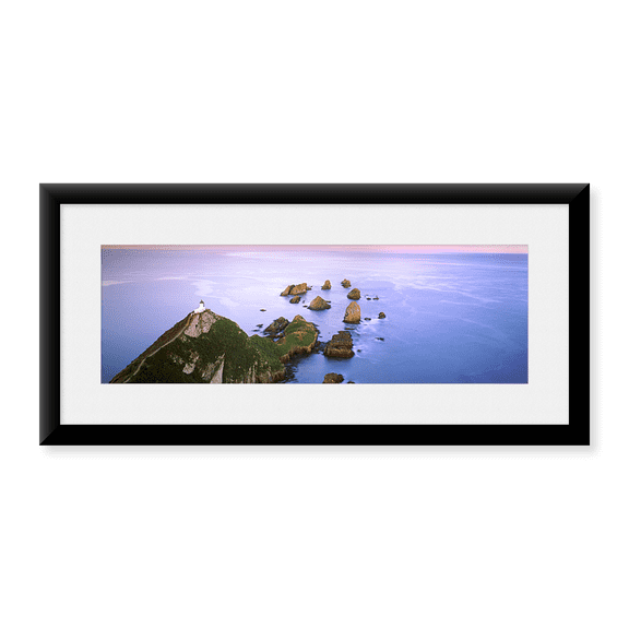 Framed Art Print, Lighthouse on the coast by Panoramic Images, 25-7/8" x 9-7/8"