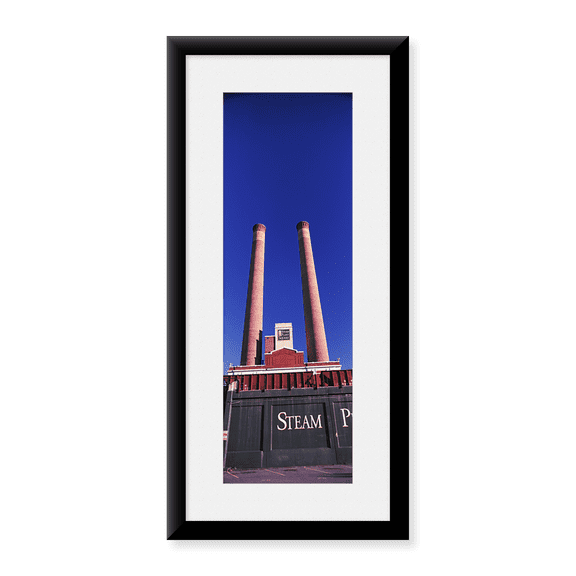 Framed Art Print, Low angle view of two smoke stacks at Steam Plant by Panoramic Images, 25-7/8" x 9-7/8"