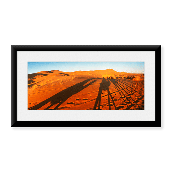 Framed Art Print, Shadows of camel riders in the desert at sunset by Panoramic Images, 14-3/8" x 21-7/8"