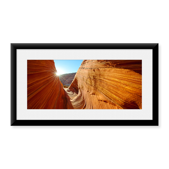 Framed Art Print, Sun shining through rock formations by Panoramic Images, 14-3/8" x 21-7/8"