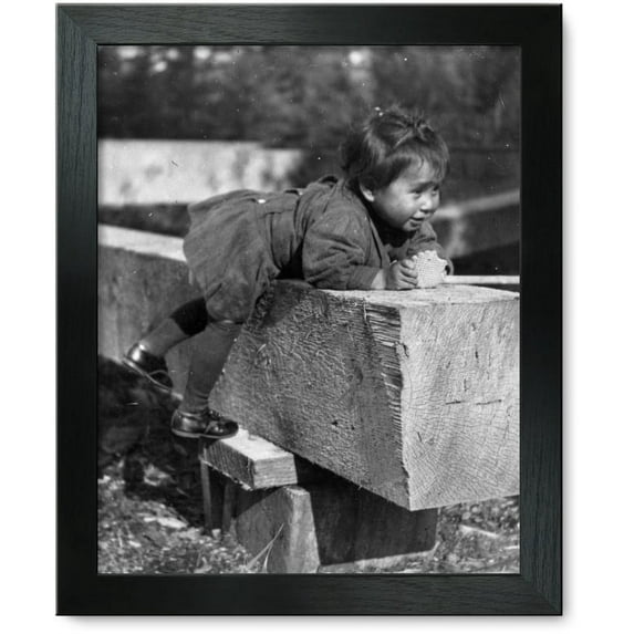 Framed Print: Eskimo Child Leaning On Block Of Wood, 1905