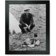 thumbnail image 1 of Framed Print: Lou Ambers Cooking Over A Campfire, Using A Tin Can On A Stick), 1 of 3