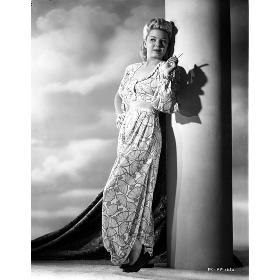 Francis Langford on a Printed Top Leaning and Smoking Photo Print (24 x 30)