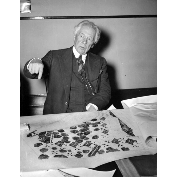 Frank Lloyd Wright by a blueprint Photo Print  (24 x 30)
