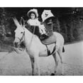 thumbnail image 1 of Franklin Roosevelt As A Toddler Seated On A Donkey At Hyde Park. 1884. He Rides In An Basketry Saddle With A Fluffy, 1 of 2