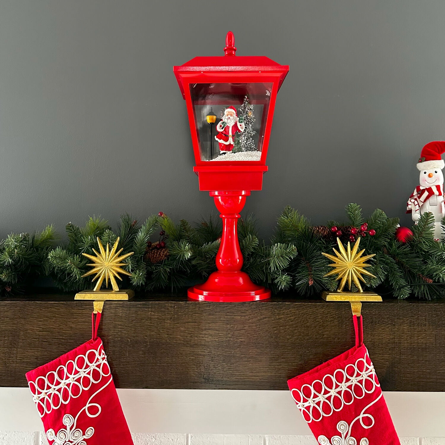 Fraser Hill Farm 25" Musical Tabletop Lantern in Red featuring Santa Scene and Snow Function