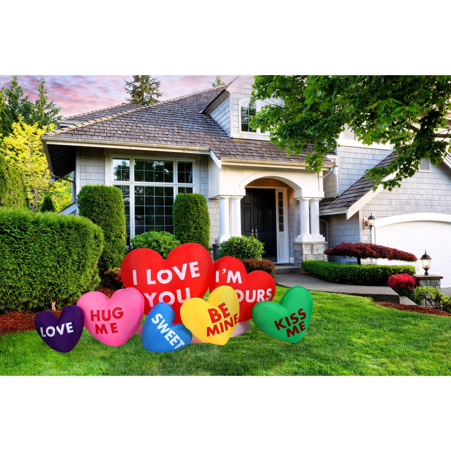 Fraser Hill Farm 6 ft. Valentine's Day Heart Candy Inflatable with LED Lights, Ropes & Stakes