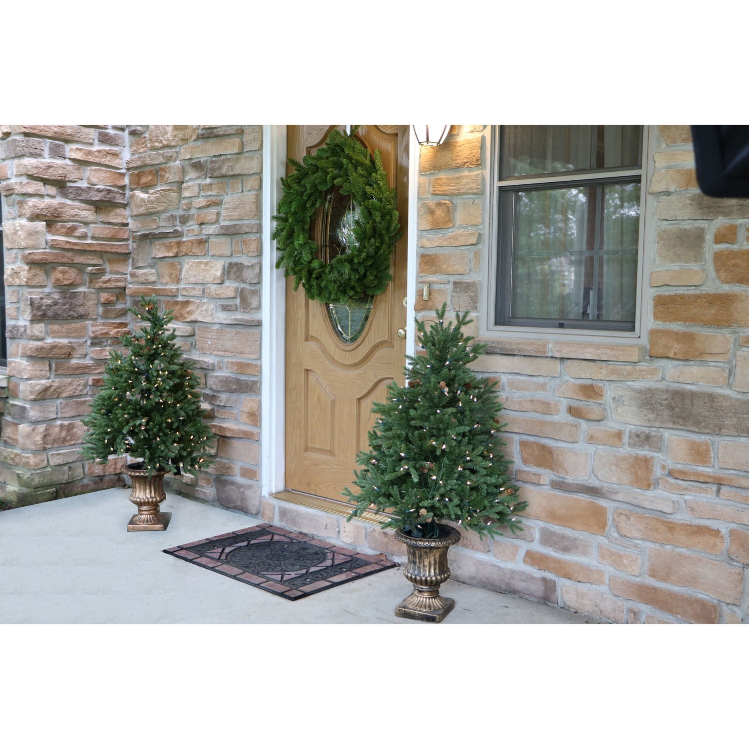 Fraser Hill Farm Set of Two 4-Ft. Noble Fir Artificial Trees with Metallic Urn Bases and Multi-Colored LED String Lights, FFNF056-6GRB/SET2