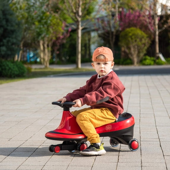 Freddo Red Swing Car with Flashing Wheels for kids 3 years and up, supports up to 110 lbs