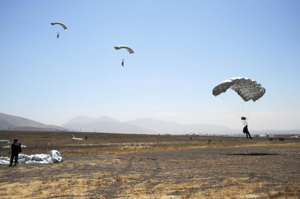 Freefall parachute jumpers approaching the Trident drop zone in San Diego Canvas Art - Stocktrek Images (34 x 23)