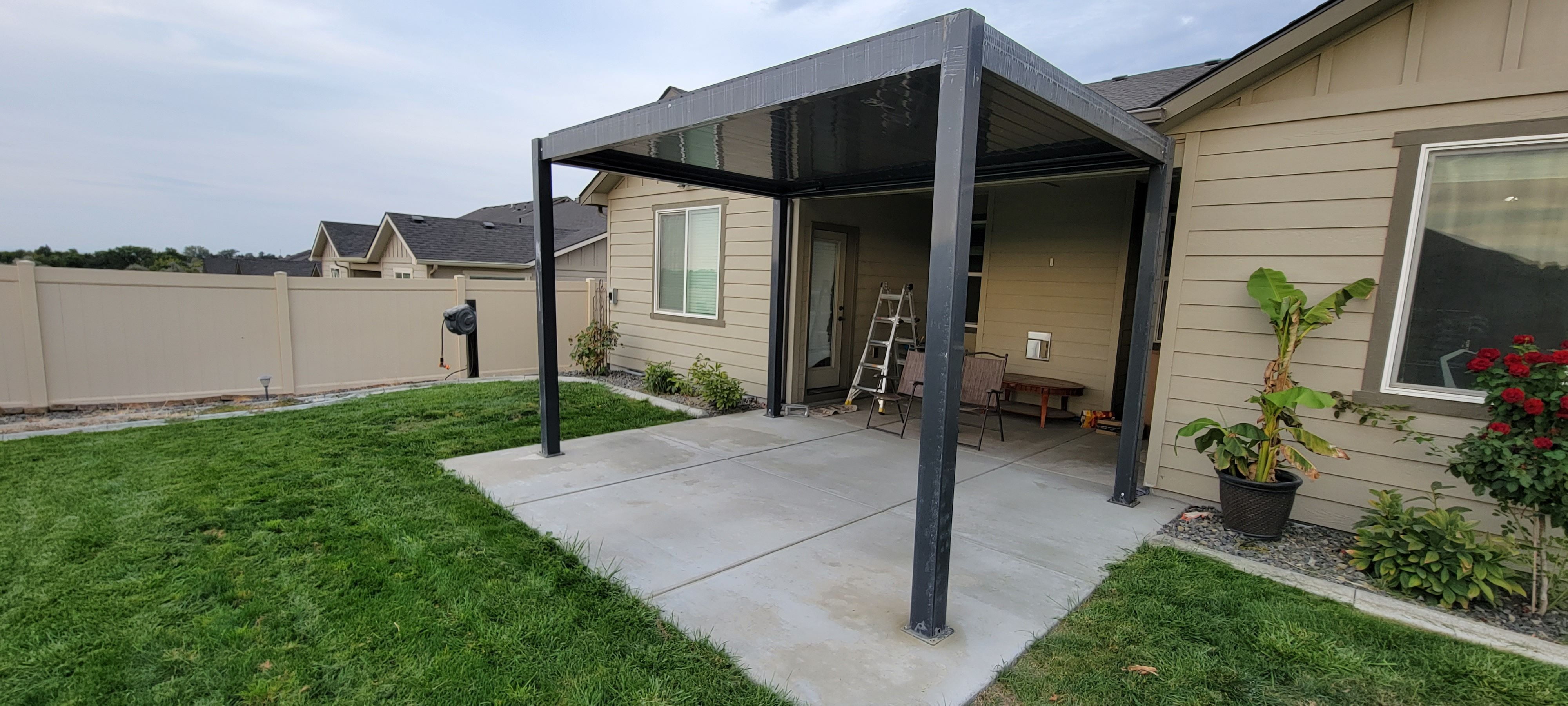 Dark Gray Motorized Aluminum Freestanding Pergola with LED Lighting
