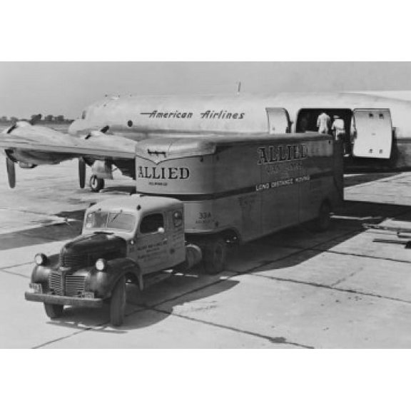 Freight being unloaded from moving truck onto American Airlines plane Canvas Art - (18 x 24)