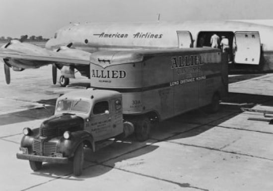 Freight being unloaded from moving truck onto American Airlines plane Canvas Art - (24 x 36)