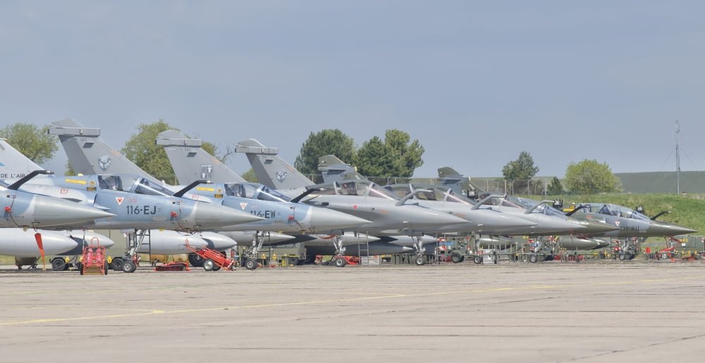 French Air Force and Royal Saudi Air Force planes on the flight line Canvas Art - Giovanni CollaStocktrek Images (39 x 21)