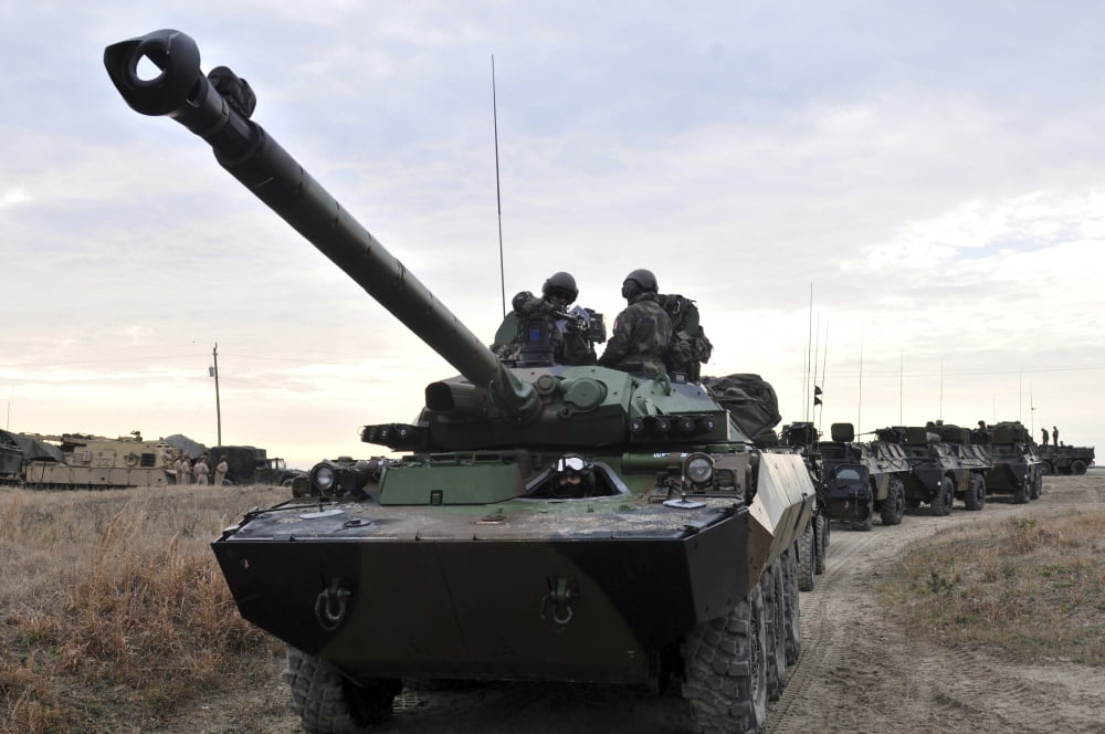 French Marines lead a convoy of combat vehicles during Exercise Bold Alligator 2012 Canvas Art - Stocktrek Images (35 x 23)