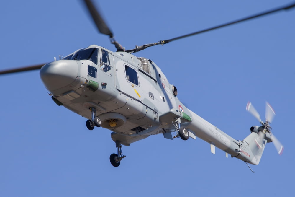 French Navy Westland Sea Lynx helicopter in flight over France Canvas Art - Timm ZiegenthalerStocktrek Images (34 x 23)