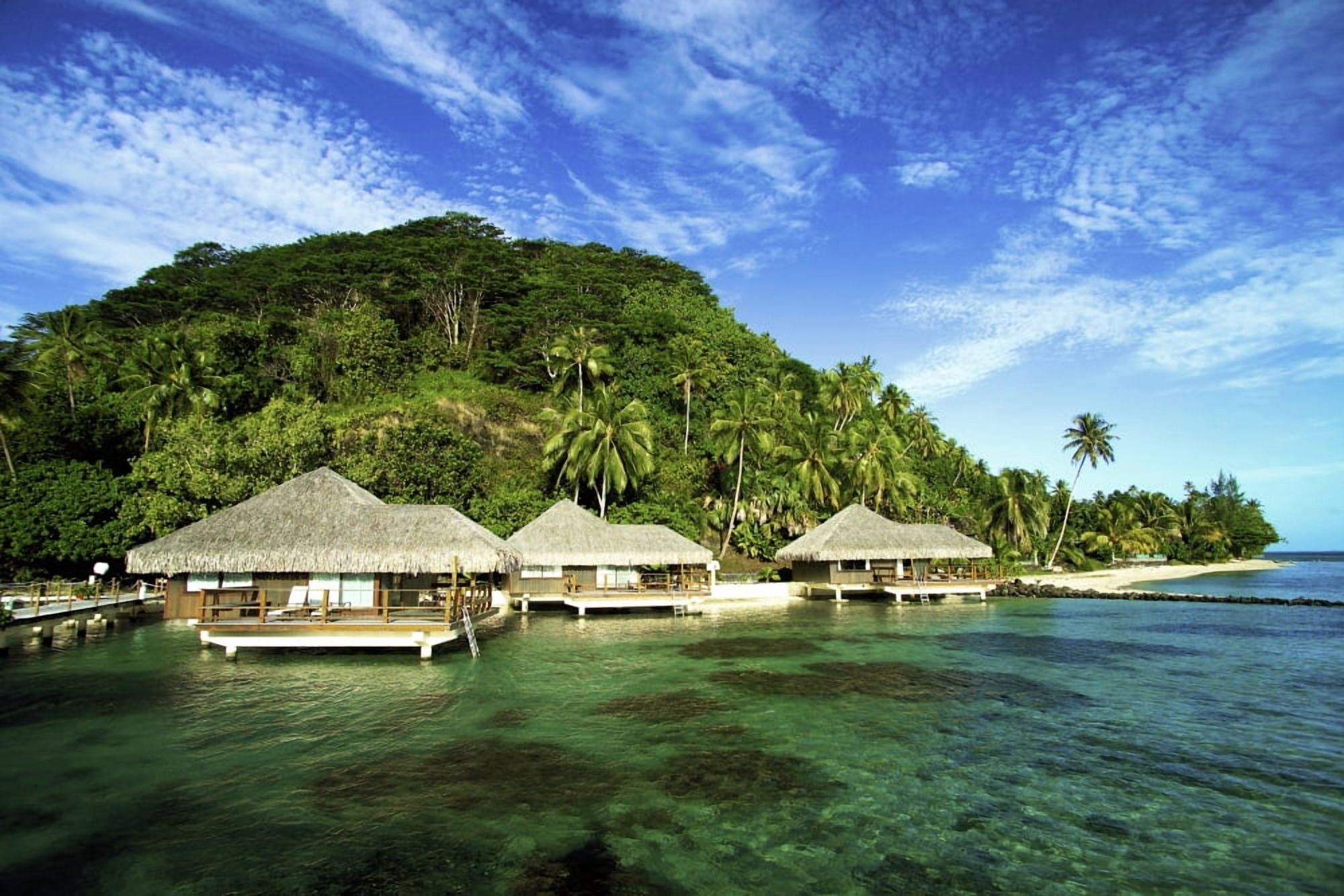 French Polynesia Huahine Te Tiare Resort Bungalows Over Ocean Tall Palm Trees Along Beach Blue Sky Canvas Art - David Cornwell Design Pics (18 x 12)