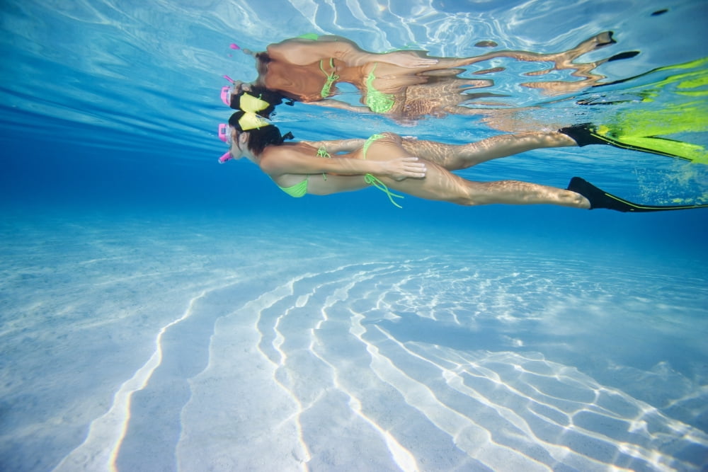 French Polynesia Moorea Woman Free Diving In Turquoise Ocean Canvas Art - M Swiet Productions Design Pics (38 x 24)